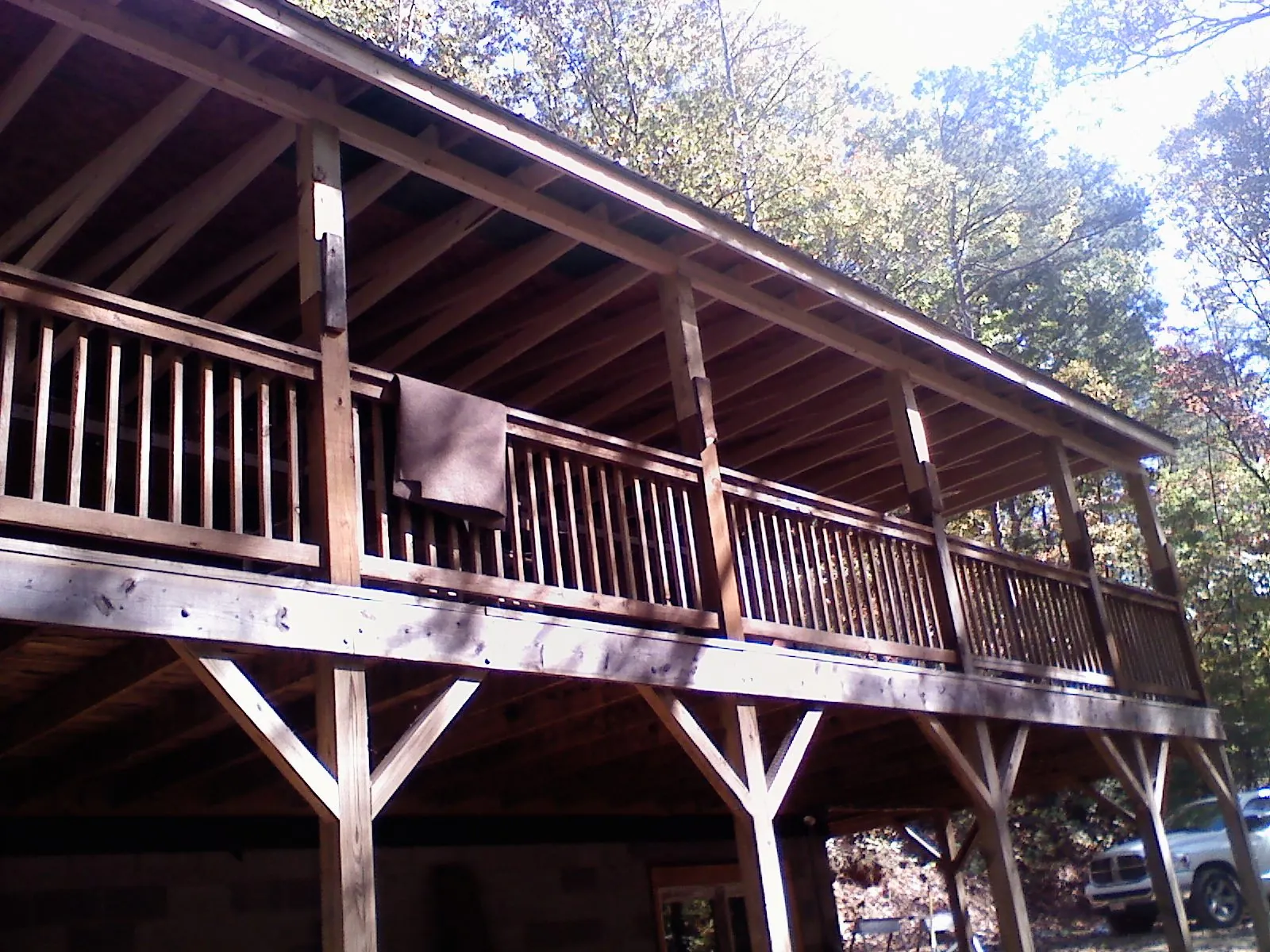 Timber framing under a new elevated porch and deck — Roof Leak Repair in Lake City by Roofing Brothers